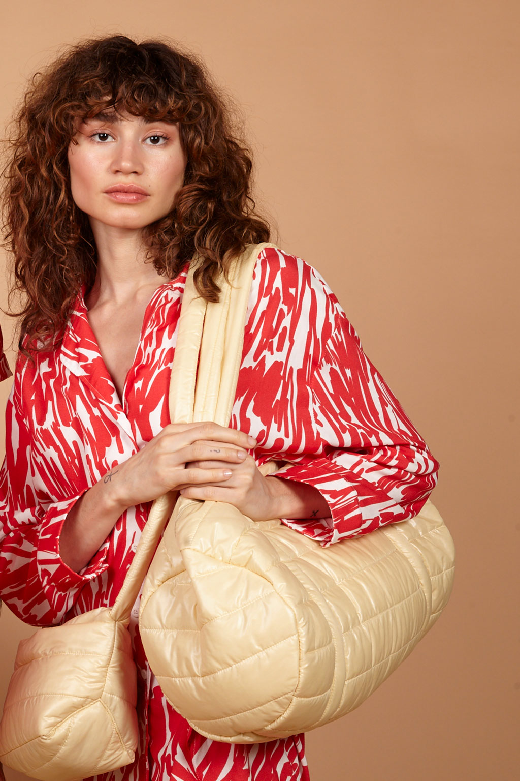 Bolsa matelassê puffer modelo academia