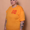 Camiseta oversize amarela estampada Kodak