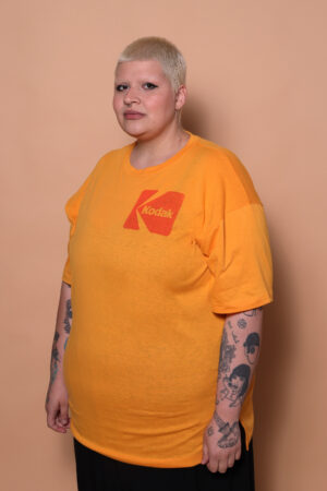 Camiseta oversize amarela estampada Kodak