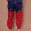 Calça nylon azul recortes vermelho