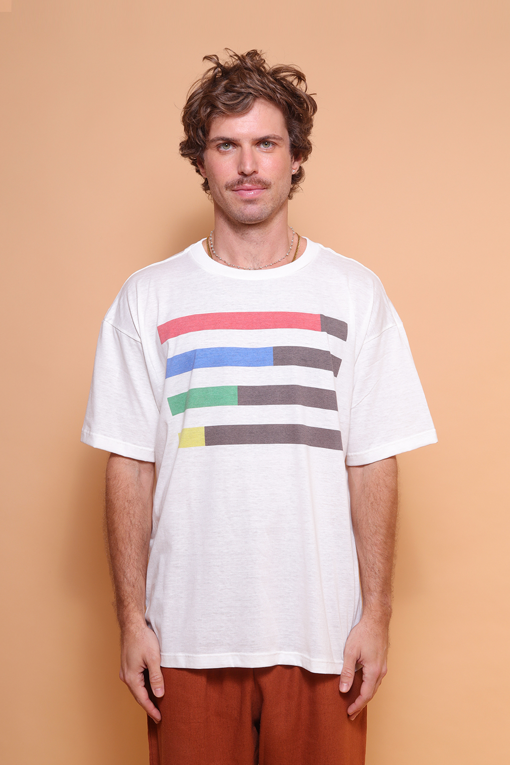 Camiseta oversize estampada Setas Coloridas