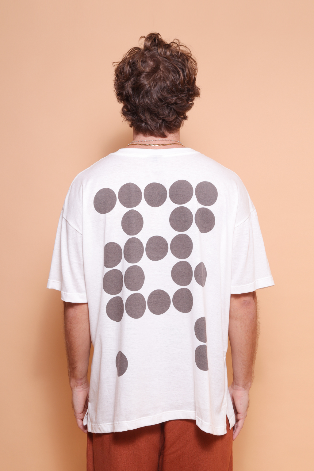 Camiseta oversize estampada Bolas Pretas