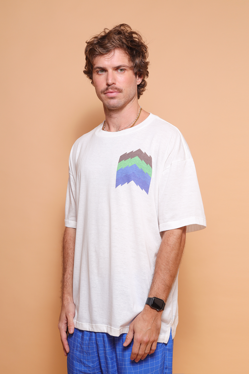 Camiseta oversize estampada Setas Coloridas