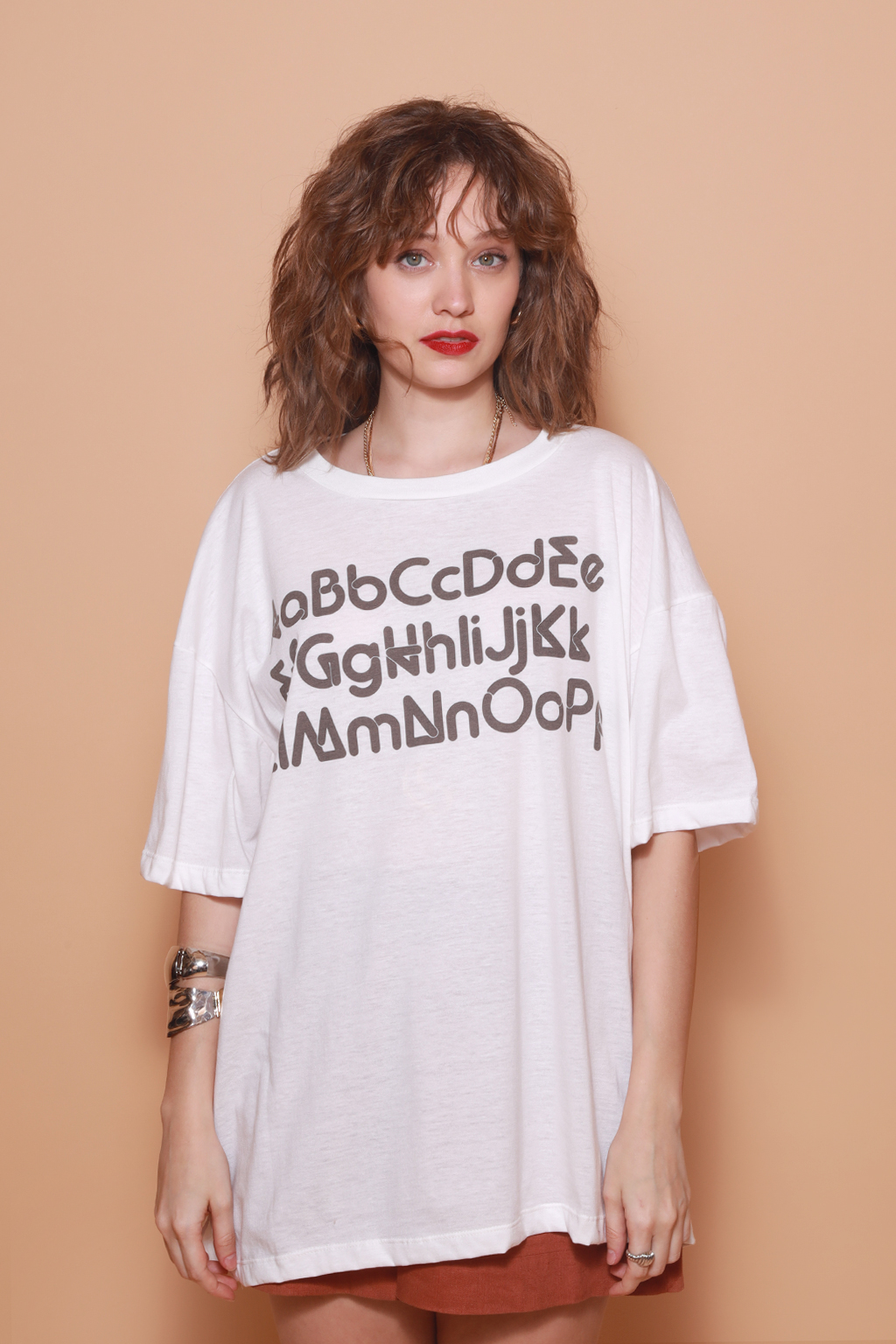 Camiseta oversize estampada Tipografia