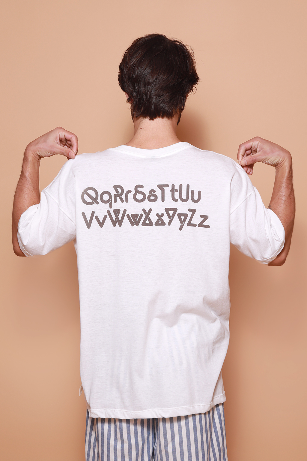 Camiseta oversize estampada Tipografia