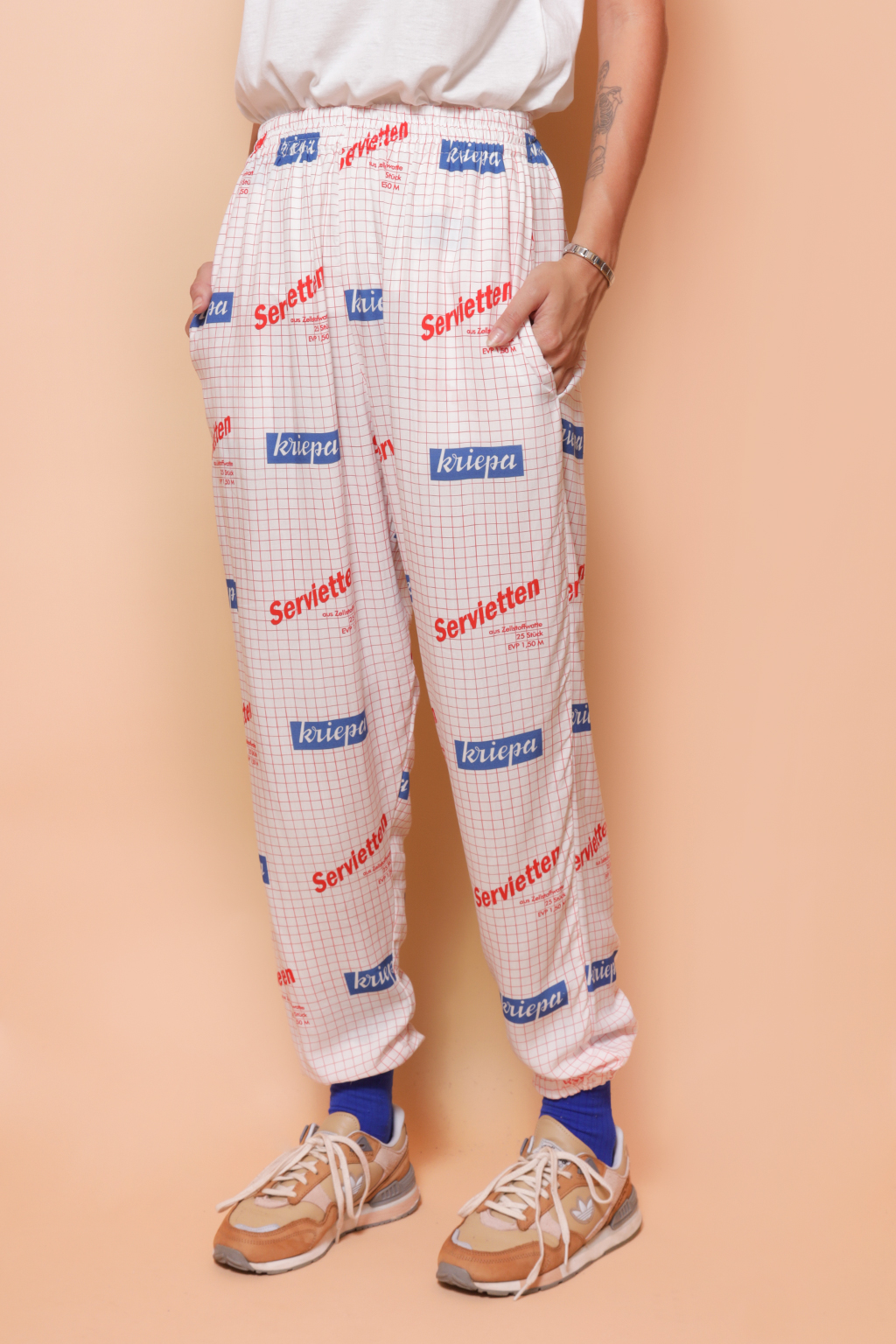 Calça jogger estampada Contact DDR