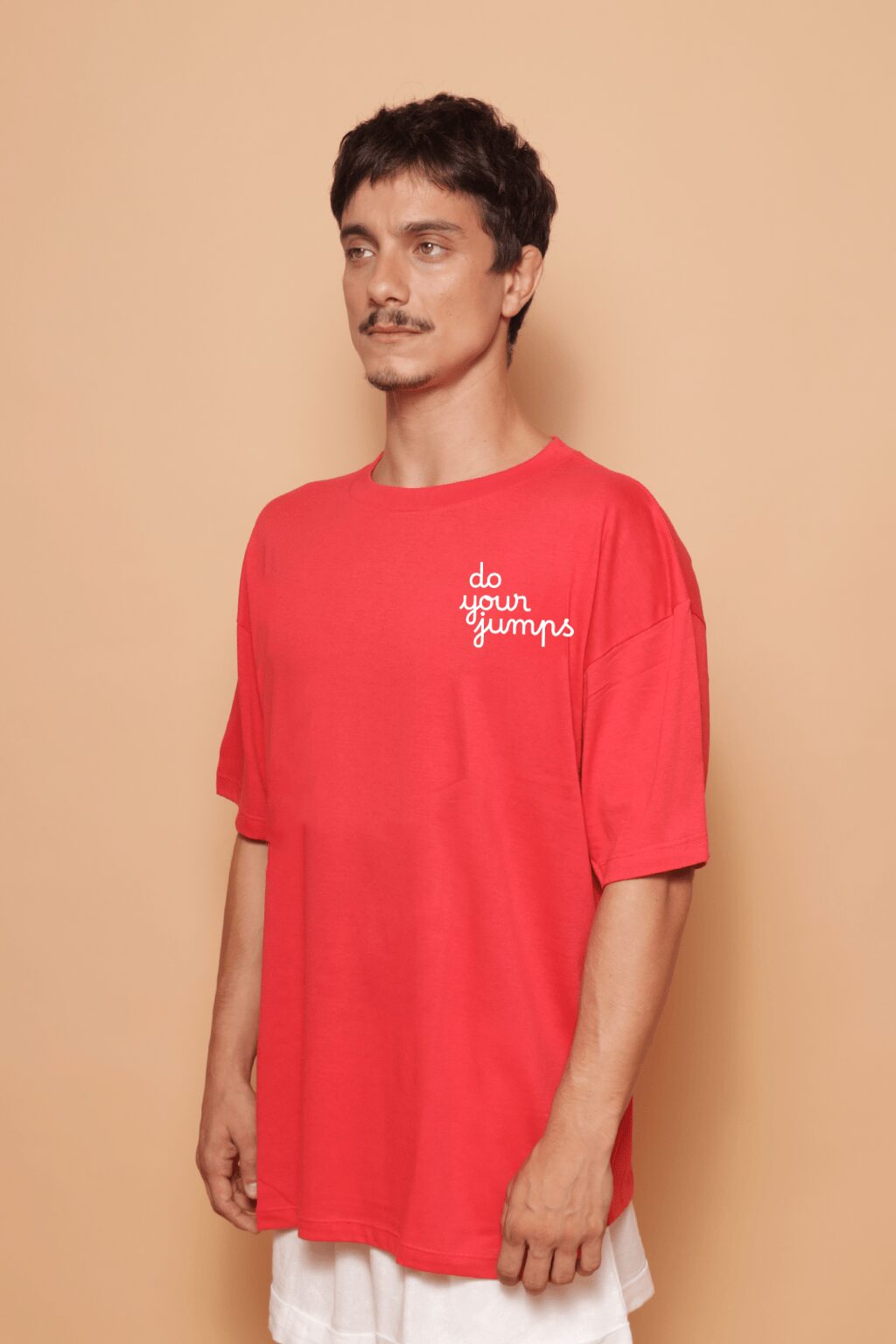 Camiseta oversize vermelha estampada Do your jumps DTF