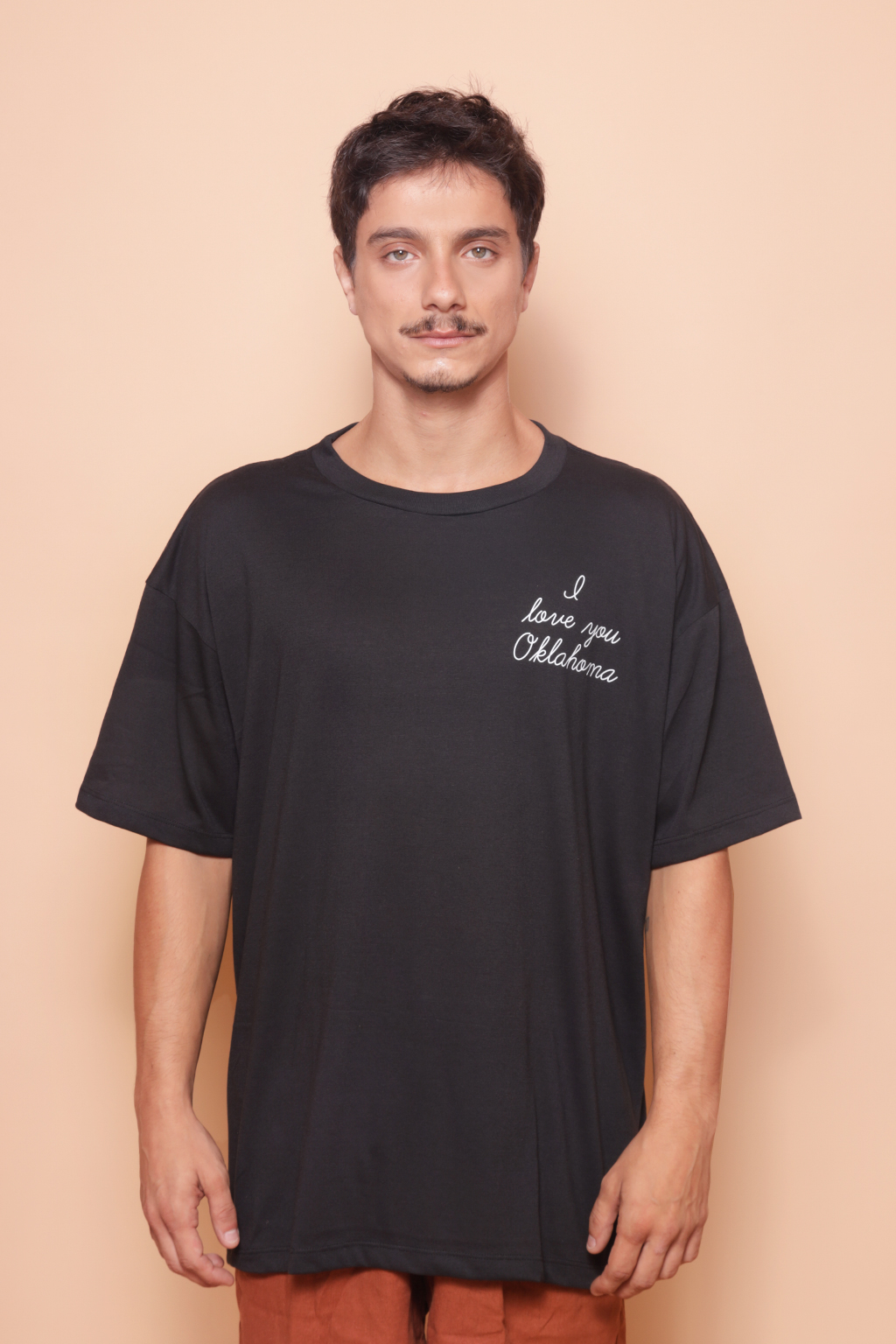 Camiseta oversize preta estampada Oklahoma