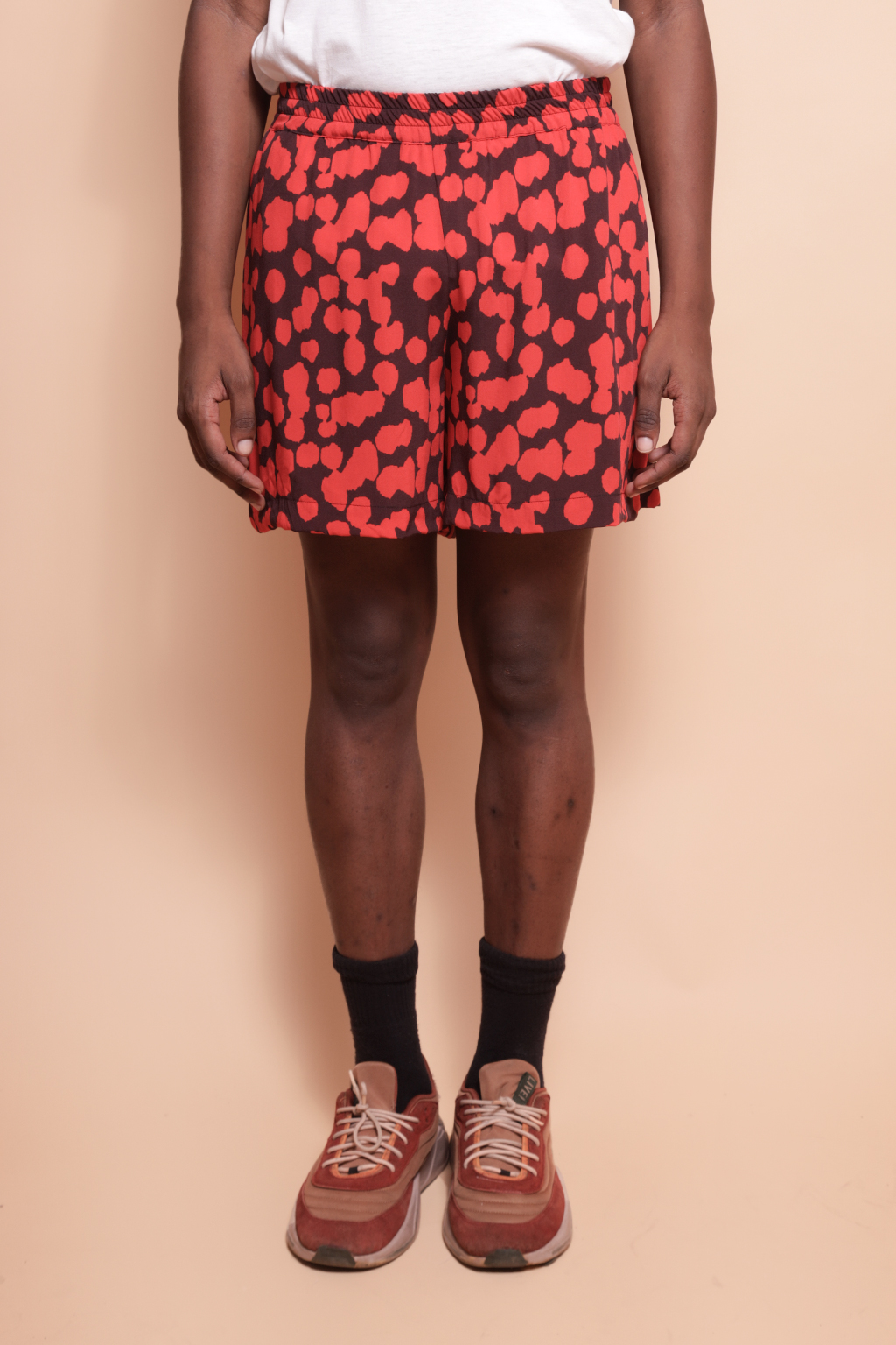 Short evasê estampado Onça Preta