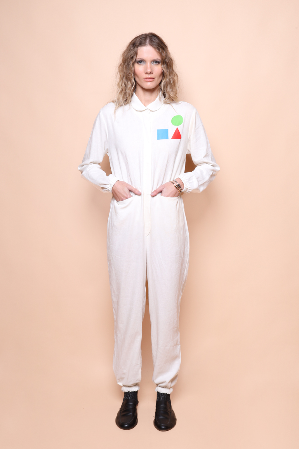 Macacão acinturado linho off-white Formas