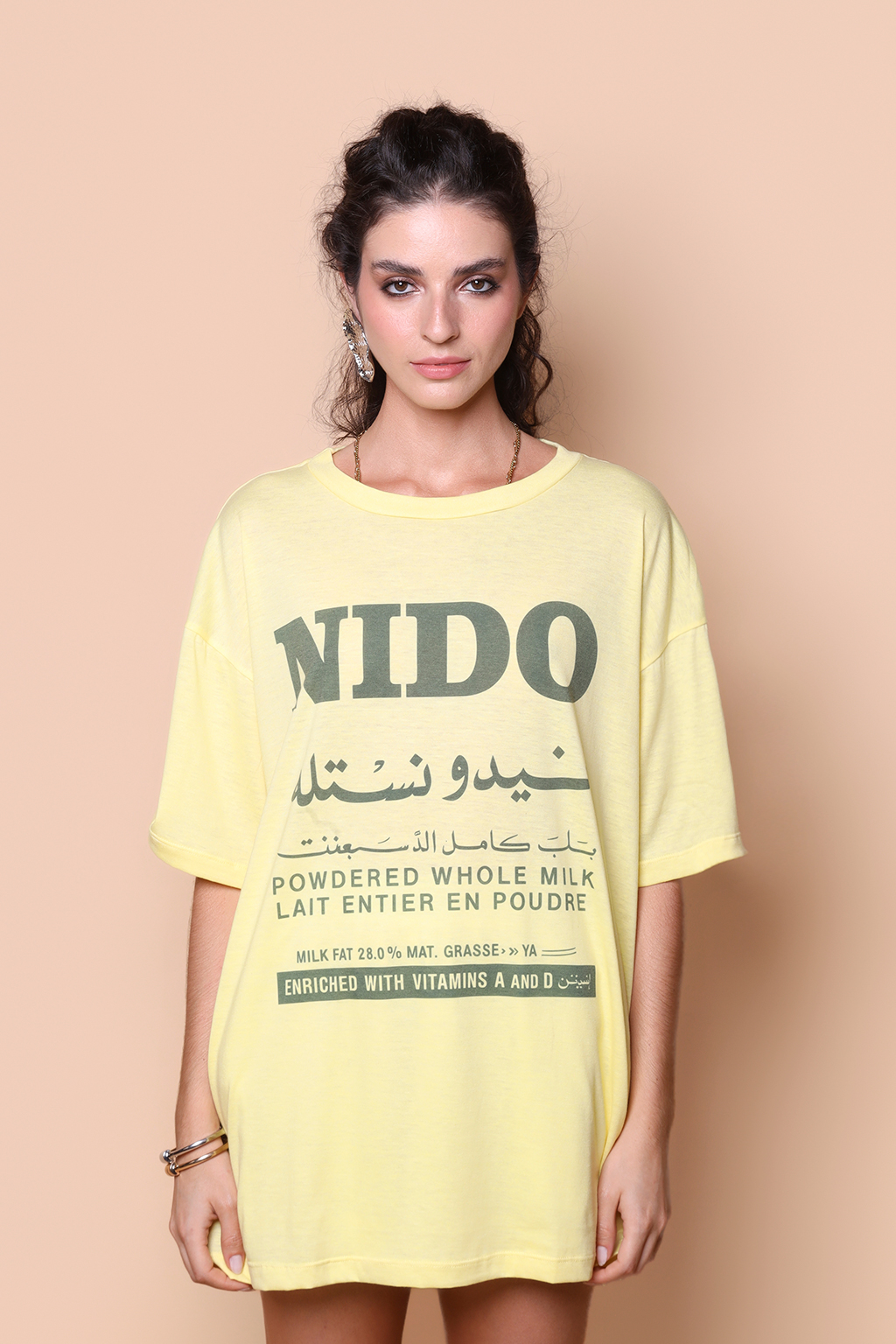 Camiseta oversize amarela estampada Nido