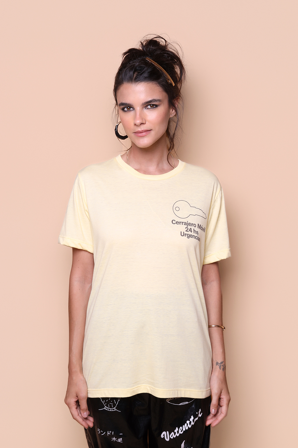 Camiseta amarela estampada Cerrajero